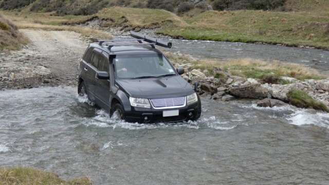 Dropping into the river crossing Just fully into the river crossing in the Suzuki Escudo.