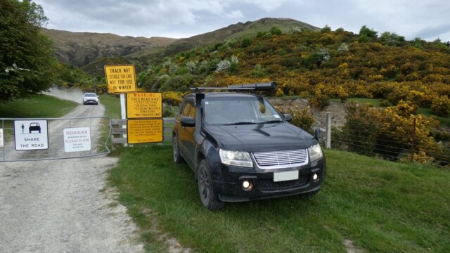 We made it to the Southern end of the Nevis Road. At the south end of the Nevis Road near Garston, the Suzuki Escudo parked at the gate with warning signs about being only 4WD