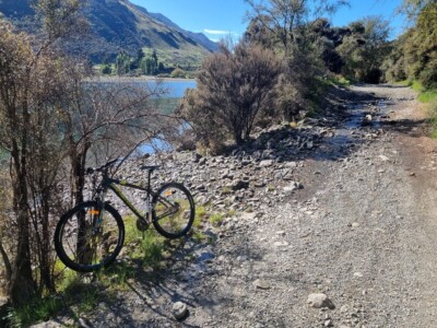 Had to stop for a photo opportunity. I have never mountain biked before on anything other than gravel so these little rocky parts for a bit of anew experience. My mountian bike leaned up against a bush to the left with Loch Katrine in the background and the mountain bike trial to the right.