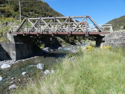 A historic bridge on the Lake Sumner Road. This was near where I stopped to let some air out of my tyres. A historic bridge on the Lake Sumner Road with a creek running below it beside the Hurunui River.