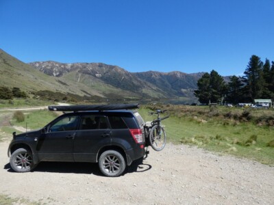 Had to close the gate and heading into Lake Taylor Stopped to close the gate with Lake Taylor camp ground and Lake Talyor in the back ground