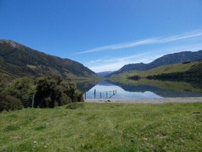 Lake Taylor looking north Lake Taylor looking north, with a fence extending into the Lake with mountins either side