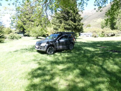 We made it to Loch Katrine. The Escudo parked under a tree. Some bachs in the background