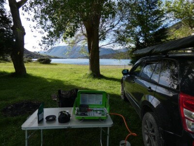 Ready to cook lunch. The cooker set up on a small table with a chair ready to cook lunch.